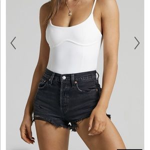 Black ripped Levi’s jean shorts